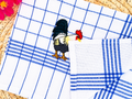 Keukenhanddoek met geborduurde haan